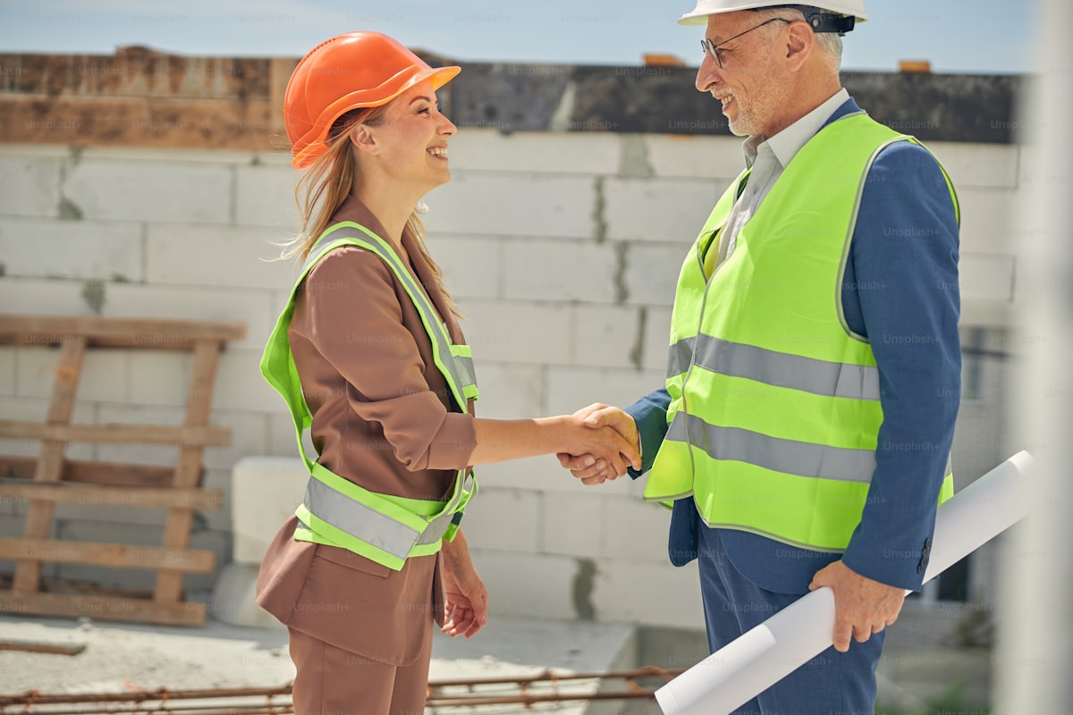 Peak Roofing Co. team member greeting a homeowner